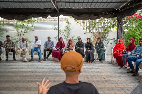 Masterclass discussion in a circle in the courtyard