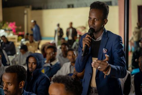 Audience member asking a question at the film festival