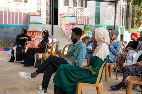 Group conversation in the courtyard