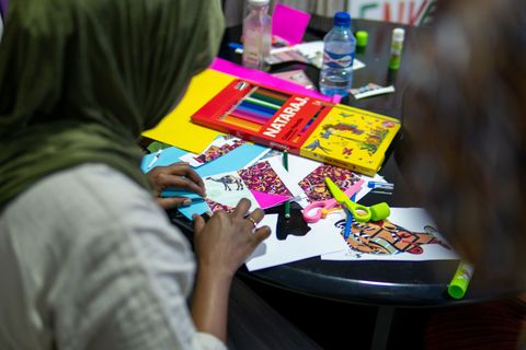 Coloured paper and pencils for book making