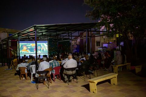 Outdoor film screening in the courtyard