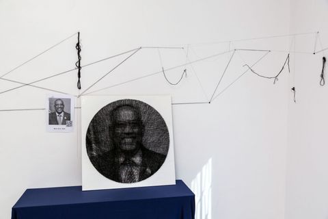 String art portrait by Isa Faysal on display