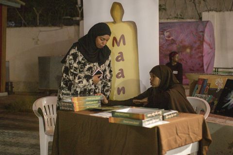 Books on a table at a creative meet-up