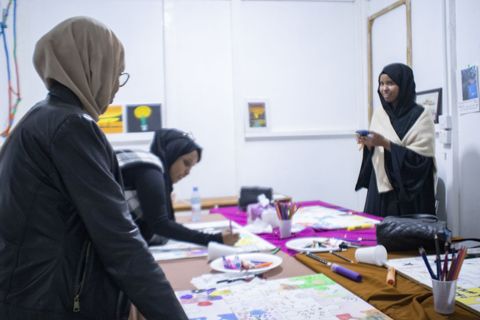 Visitors at work in the workspace