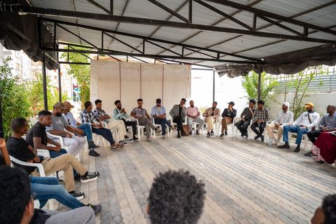 Masterclass circle in the courtyard by day